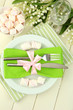 Table setting in white and green tones