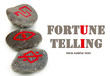 Fortune telling  with symbols on stones isolated on white
