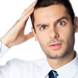 Shocked business man, on white