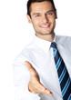 Photo: Business man giving hand for handshake, isolated Business man giving hand for handshake, isolated