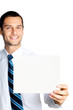 Happy businessman showing signboard, isolated