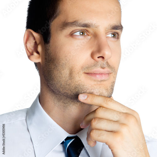 Photo: Portrait of thinking businessman, on white Portrait of thinking businessman, on white