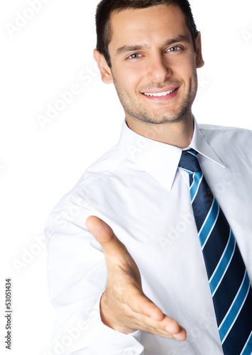 Photo: Business man giving hand for handshake, isolated Business man giving hand for handshake, isolated