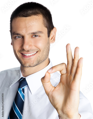 Photo: Businessman with okay gesture, isolated Businessman with okay gesture, isolated