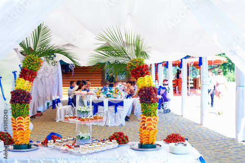 Photo: colorful fruit and cake decoration on banquet party colorful fruit and cake decoration on banquet party