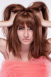 portrait of a girl holding his hair