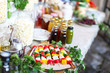 Vegetable skewers with cheese, popcorn at the picnic