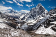 Mountains Ama Dablam, Cholatse, Tabuche Peak at the blue sky wit