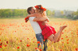 Couple on the poppy meadow