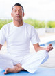 Foto: Man practicing yoga Man practicing yoga