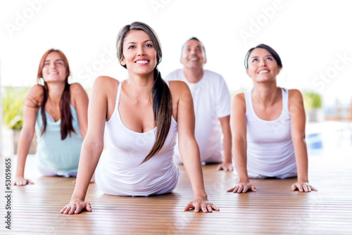 Photo: People in a yoga class People in a yoga class