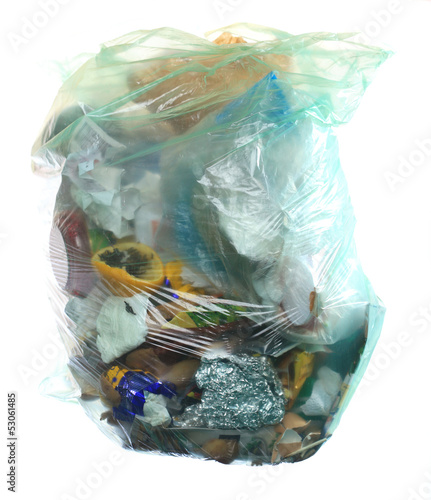 Photo: Green rubbish bag with garbage Green rubbish bag with garbage