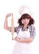 Smiling happy cook woman holds a kitchen wood utensil