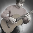 Foto: Acoustic guitar guitarist playing Acoustic guitar guitarist playing