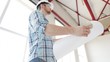 builder making orders on site