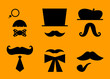 Mustaches and hats retro accessories isolated on orange