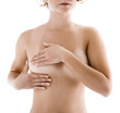 Woman examining her breast isolated on white background