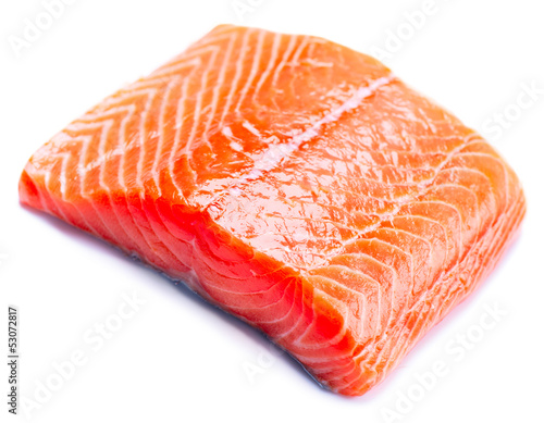 Photo: Salmon Raw Fillet. Red Fish isolated on a White Background Salmon Raw Fillet. Red Fish isolated on a White Background