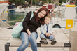 Foto: Mother and son in harbor Mother and son in harbor