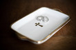 wedding rings on a tray with cross
