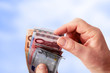 Hands holding banknotes