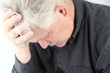 very depressed older man