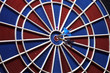 center of the target dartboard and two arrows