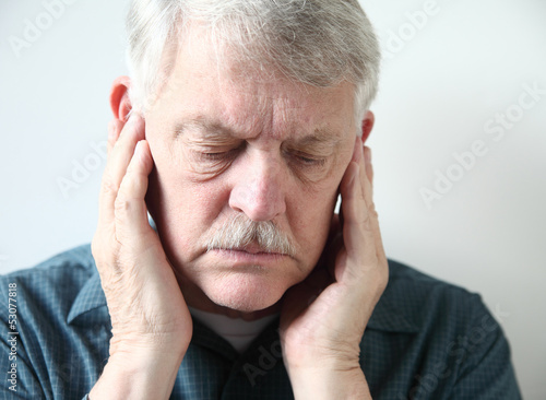 Photo: senior with pain in front of ears senior with pain in front of ears