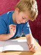 boy is writing