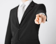 man pointing his finger at you