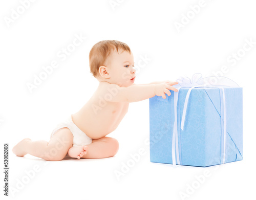 Photo: happy child with gift box happy child with gift box