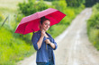Teenage Girl with Red Umbrella