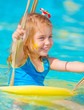 Baby girl in water park