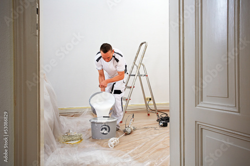 Photo: professional painter at work professional painter at work