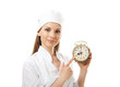 medical female doctor holding alarm clock,  isolated on white
