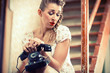 Woman sitting on the stairs and waiting for a call