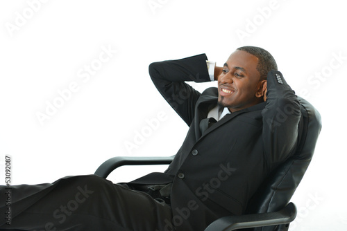 Photo: Business Man Relaxing on Chair Business Man Relaxing on Chair