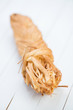 Photo: Vertical shot of fresh braided cheese, close-up Vertical shot of fresh braided cheese, close-up