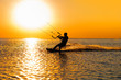Silhouette of a kitesurfer