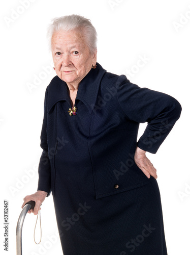 Photo: Old woman holding her lower back Old woman holding her lower back