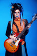 Rock girl posing with electric guitar playing hard-rock isolated