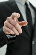 Photo: Businessman pointing finger at you Businessman pointing finger at you