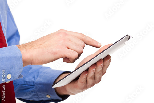 Photo: Man using a digital tablet Man using a digital tablet
