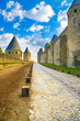 Photo: Carcassonne Cite, fortified town on sunset. Unesco site, France Carcassonne Cite, fortified town on sunset. Unesco site, France