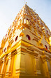 golden pagoda at buddhist temple in Kanchanaburi Province, Thail
