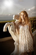 Photo: Beautiful woman in white dress Beautiful woman in white dress