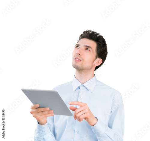 Photo: Young businessman with tablet computer Young businessman with tablet computer