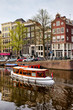Boats on Canal in Amsterdam