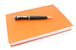 Pen on  red notebook
