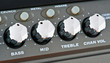 controls of a guitar amplifier, making macro